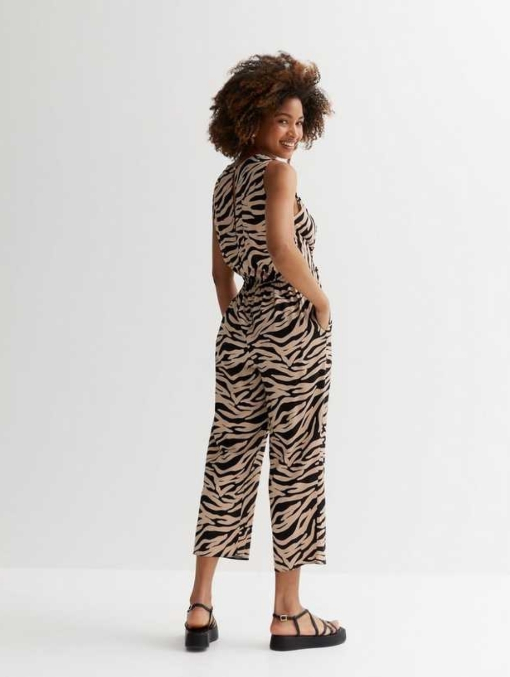 Sleeveless Beige and Black Zebra Print Jumpsuit